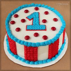 a fourth birthday cake decorated with red, white and blue icing