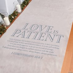 a white memorial with the words love is patient written on it