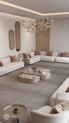 a living room filled with lots of white furniture