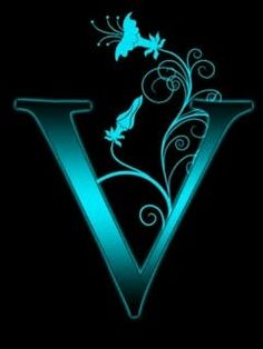 the letter v is lit up in blue and has swirly designs on it's sides