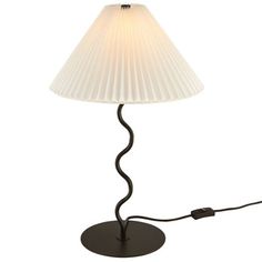 a table lamp with a white shade on it's base and a cord attached to the bulb