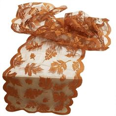 an orange and white scarf with flowers on it