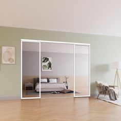 an empty room with mirrored doors and furniture