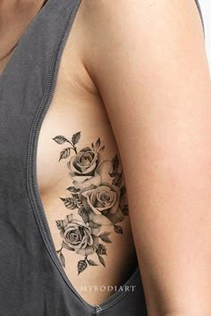 a woman with a rose tattoo on her chest