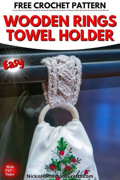 a white bag with a knitted christmas tree on it and the text free crochet pattern wooden rings towel holder