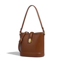 This bucket bag is crafted from soft PU leather in a timeless silhouette that'll work for every day. With double straps, you can wear it in different ways and it's spacious enough for all your essentials. This tan brown shade is perfect for styling with knitwear and printed dresses this year.Weight: 720 gWidth (cm): 15 cmHeight (cm): 22.5 Color: CoffeeStrap Length: 53 cmInterior Material: PolyesterMaterial_bag: PU LeatherBagType: Handbag & Crossbody bagBag Length: 24 cm Elegant Bucket Box Bag With Adjustable Strap, Luxury Timeless Leather Bucket Bag, Everyday Hobo Bag With Bucket Shape, Classic Bucket Shoulder Bag With Detachable Strap, Leather Bucket Baguette Bag For Daily Use, Leather Bucket Shoulder Bag With Adjustable Strap, Elegant Bucket Shoulder Bag For Everyday Use, Versatile Leather Satchel Bucket Bag, Bucket Shoulder Bag With Adjustable Strap