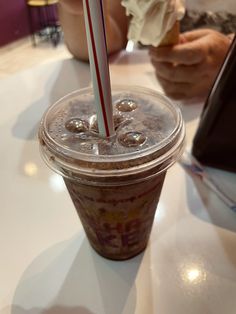 an ice cream sundae sitting on top of a table