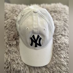 Nwt One Size Fits Most. White With Dark Blue Ny Trendy White Hat For Everyday Use, Trendy White Hat For Everyday, Trendy Everyday White Hat, Casual White Spring Hat, White Dad Hat, One Size Fits Most, Trendy White Baseball Cap With Short Brim, White Baseball Cap Dad Hat For Spring, White Dad Hat Visor For Spring, White Dad Hat Baseball Cap For Spring