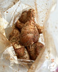 a stuffed animal in a plastic bag filled with spices and seasoning on it's side