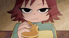 an anime character is eating food with her eyes wide open