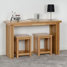 The Richmond range is solid wood with a medium oak coloured varnish. The Table folds away perfectly with a simple fold over design. It becomes very compact, and can even be used as a Console table!. So ideal where space is limited. The stools are available in pairs. A pair of stools will easily store under the folded up table. Self assembly Table dimensions closed: 120W x 77H x 40D x cm (47¼ x 30¼ x 15¾ in) Table dimensions open: 120W x 75H x 80D cm (47¼ x 29½ x 31½ in) Stool (each): 34W x 45H x 34D cm (13½ x 17¾ x 13½ in) Please remember to measure your available space before ordering. If using on an un-carpeted floor we recommend rubber or felt protection pads be used under the legs to avoid damage to your floors. Available in: Foldaway Table - Pair of Stools Non-Returnable under our app Space Saving Dining Table, Foldable Dining Table, Electric Adjustable Beds, Family Dining Rooms, Folding Dining Table, Family Dining, Container House Design, Oak Dining Table, Small Dining