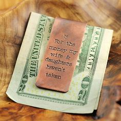 a money clip with the words for the money my wife and daughters haven't taken