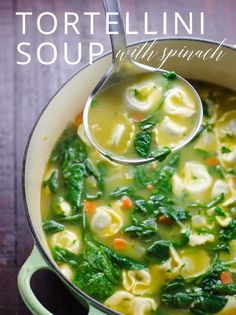 tortellini soup with spinach in a pot