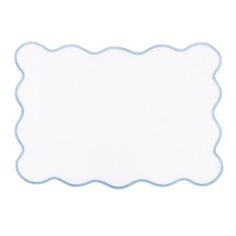 a white place mat with scalloped edges on a white background for text or image