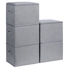 three grey storage boxes stacked on top of each other