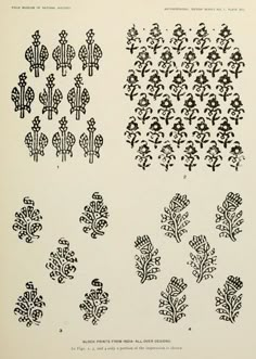 an old book with black and white designs on the pages, including small trees in different sizes