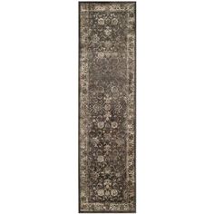 a long rug with an ornate design on the bottom and sides, in grey tones