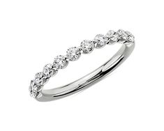 a white gold wedding band with diamonds