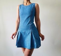 vintage blue denim mini dress,MOD style denim skater dress *size: xxs-xs *measurements (centimeters) bust 76 waist 62 hips 82, length 80 *condition: great vintage condition *fabric: cotton *washing instructions: gently hand wash in cool water or dry clean it Please make sure you check all the measurements of the item before purchasing. Vintage garment sizes are not the same as those of today. To ensure your best fit it's best you measure yourself or a similar item. The size listed it's an approx Fitted Mini Length Denim Dress, Medium Wash Denim Mini Dress, Vintage Summer Denim Mini Dress, Fitted Cotton Denim Mini Dress, Summer Vintage Denim Mini Dress, Fitted Mini Cotton Denim Dress, Vintage Denim Mini Dress, Fitted Blue Vintage Denim Dress, Fitted Vintage Blue Denim Dress