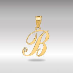 This 14K Gold Cursive Letter "B" Initial Pendant combines minimalist beauty with a touch of luxury, thanks to its sleek, flowing design and a real diamond accent. It's perfect for daily wear, subtly enhancing casual outfits with its understated elegance. To perfectly showcase this pendant, we recommend to pair it with our 1.5mm diamond-cut Rope chain. The diamond cuts on the chain will add a sparkling effect, enhancing the luster of the pendant and creating a cohesive and luxurious look. This co Initial Pendant Necklace B, B Initial, Diamond Initial Necklace, Minimalist Beauty, Cursive Letters, Gold Link, 14k Gold Necklace, Letter B, Letter Pendants