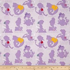 a purple fabric with silhouettes of women in various poses and words on it, as well as an apple