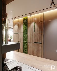 a modern bathroom with wood paneling and green plants on the wall behind the sink