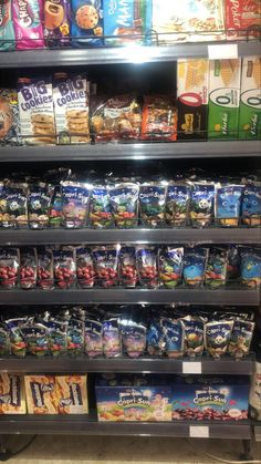 an assortment of snacks on display in a store