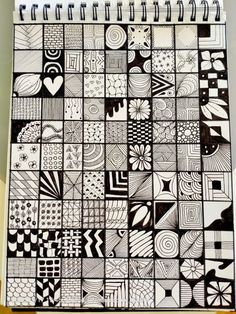 a notebook with many different designs on it