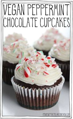 chocolate cupcakes with white frosting and peppermint sprinkles