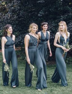 the bridesmaids are dressed in dark grey dresses