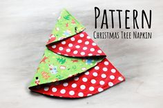 a christmas tree made out of red and green polka dot fabric with the words pattern on it