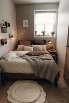 a bed sitting in a bedroom next to a window with string lights on the wall