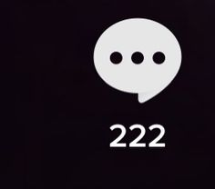 a white speech bubble with the number 22 on it's side and two black dots in the middle