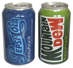 two cans of soda sitting next to each other