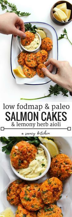 salmon cakes and lemony herb oil are served on white plates with lemon wedges