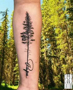 a pine tree with the word faith written in cursive font on the foot