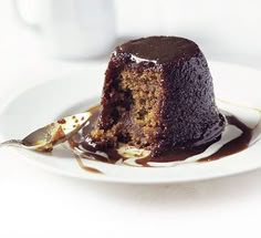 a piece of chocolate cake on a white plate