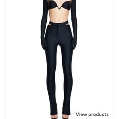 Mugler H&M. Fitted Pants In Thick, Stretch Jersey With A Sheen. Detached Waistband With A Skin-Peeking Cut-Out Section At Back And Discreet Zip Fly At Front With Concealed Button And Hook-And-Eye Fastener. Extra-Long Legs With Stitched Creases At Front And Back And Extra-Flared Hems. Sizethe Model Is 178cm/5'10" And Wears A Size 4 Fitfitted Compositionpolyamide 78%, Spandex 22% Additional Material Informationlining: Cupro 100% Elastane High-cut Leg Pants For Party, Luxury Stretch Bottoms For Party, Designer Fitted Pants For Evening, Designer Fitted Evening Pants, Luxury Fitted Bottoms For Evening, High-cut Leg Elastane Pants For Night Out, Tailored Luxury Bottoms For Night Out, Designer Fitted Evening Bottoms, High-cut Leg High Stretch Party Pants