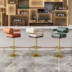 three bar stools in front of a counter with bottles on the shelves behind them