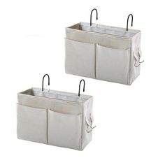 two white canvas storage bins with handles