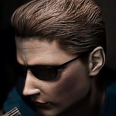 a close up of a person wearing sunglasses and holding a toothbrush in their hand