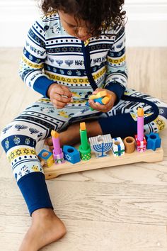 Wishing your family peace and light this holiday season. This festive holiday print in shades of blue and gold, features a Happy Hanukkah message, and the menorah used to celebrate Chanukah. We've added a fun holiday twist with rows of cozy kittens. If you look closely, you can see them playing with the dreidel! Who says Hanukkah pajamas all have to look the same?! Featuring our hypoallergenic bamboo viscose fabric in a one-piece sleeper pajamas. Designed with the must have two way zipper, to si Sleeper Pajamas, Family Peace, Cat Sanctuary, Footie Pajamas, Cat Pajamas, Bamboo Pajamas, Footie Pajama, One Piece Pajamas, Happy Hanukkah