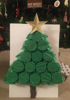 a christmas tree made out of green cups