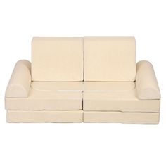 two white couches sitting next to each other on a white background with no one in it