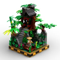 a lego model of a tree house with stairs and trees