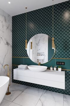 a bathroom with green and white wallpaper, marble counter top and round mirror above the sink