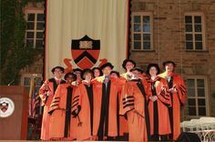 a group of people standing on top of a stage