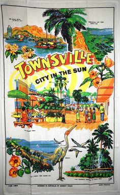 a towel with the words townsville on it and an image of a bird in front of palm trees