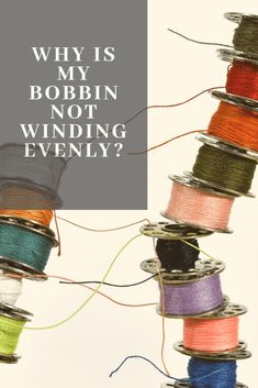 several spools of thread with the words why is my bobbin not winding evenly?