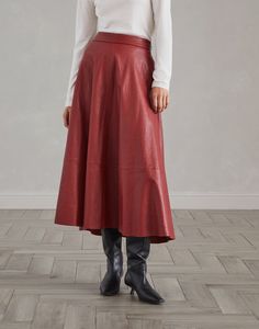 Natural leather midi circle skirt The refined natural leather reinterprets the classic style of this Circle Midi skirt in a contemporary way. The polished leather enhances the season’s colors and is paired with a relaxed, slightly flared silhouette, creating a sophisticated design contrast. The Midi length highlights the skirt’s feminine nature. Classic Leather Skirt For Fall, Leather Relaxed Fit Lined Skirt, Relaxed Flared Leather Skirt, Leather Midi Skirt With Lining, Leather Lined Midi Skirt, Leather Midi Skirt For Work, Formal Leather Flared Skirt, Formal Flared Leather Skirt, Spring Leather Midi Skirt